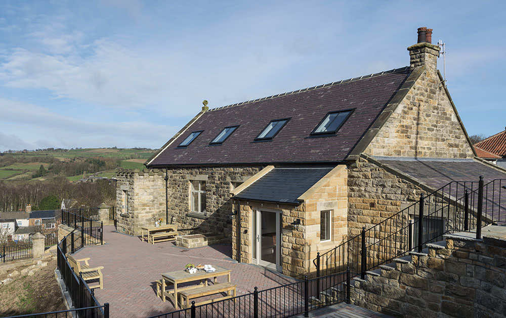 Stone cottage terrace with countryside views in the North York Moors